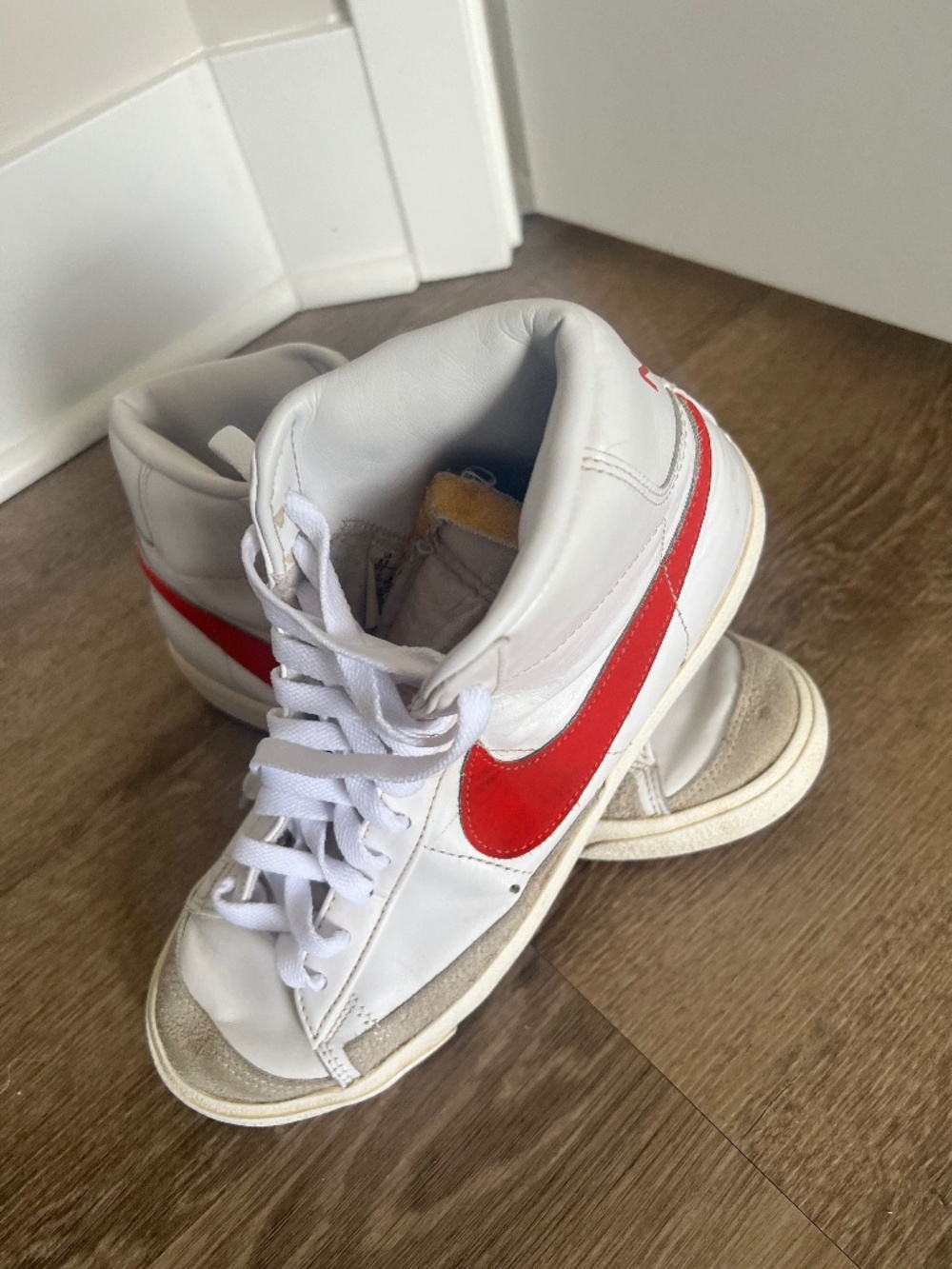 Women’s Nike red swoosh high top sneakers size 8.5